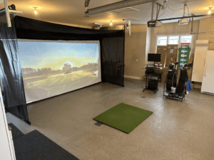 Retractable golf impact screen